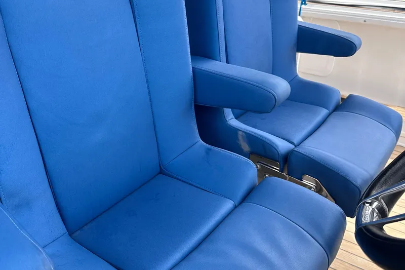 Slide: The Image of Blue seats on a 2020 Fjord 44 Open boat, showcasing luxury and comfort. - 38