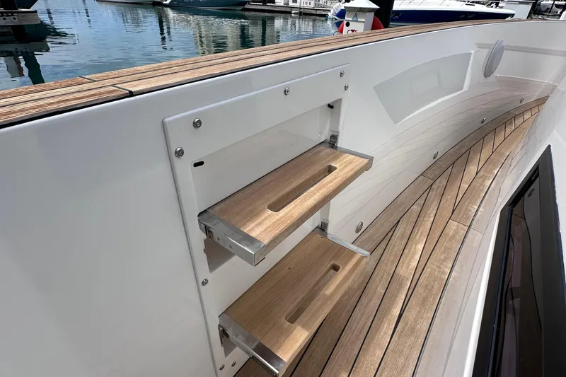 Slide: The Image of 2020 Fjord 44 Open yacht with wooden deck and foldable steps. - 40