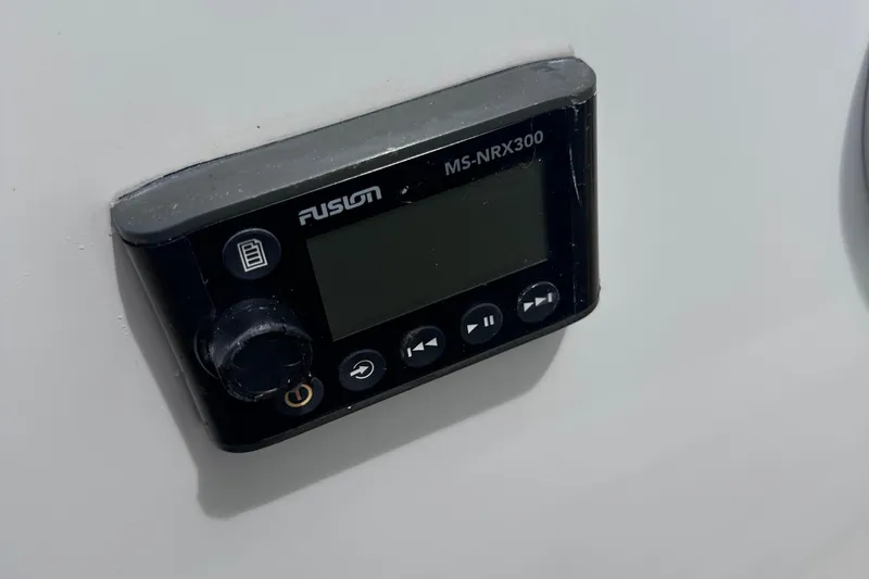 Slide: The Image of Fusion MS-NRX300 marine stereo control on 2020 Fjord 44 Open boat. - 45