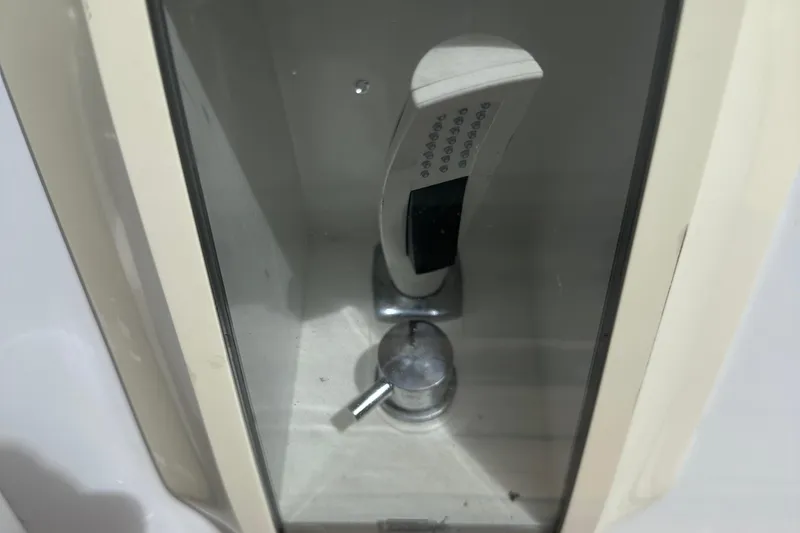 Slide: The Image of Shower fixture inside a 2020 Fjord 44 Open boat, featuring a modern design. - 49