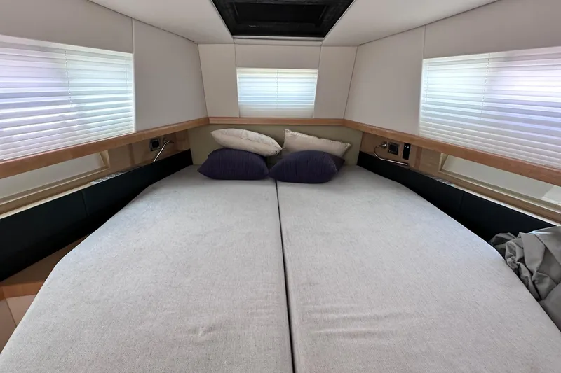 Slide: The Image of 2020 Fjord 44 Open cabin interior with cozy bed and modern design. - 51
