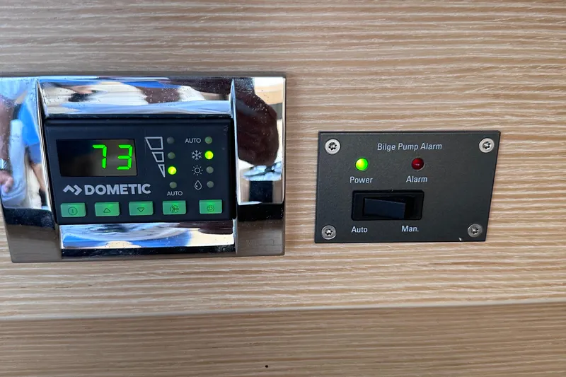 Slide: The Image of Dometic control panel and bilge pump alarm on 2020 Fjord 44 Open yacht. - 54