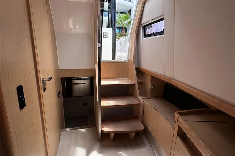 Slide: The Image of Interior of 2020 Fjord 44 Open yacht with wooden stairs and modern design. - 55