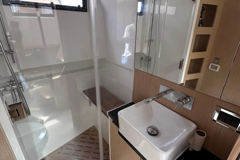 Slide: The Image of Modern bathroom interior of 2020 Fjord 44 Open yacht with sleek fixtures and glass shower. - 57