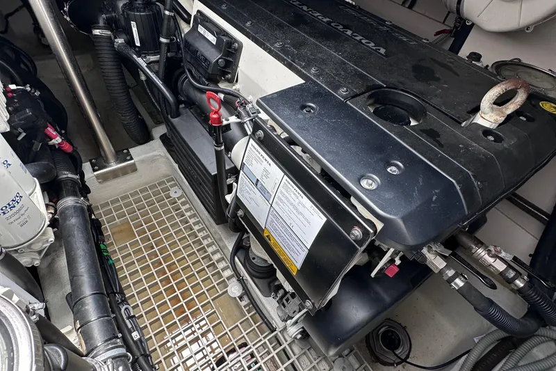 Slide: The Image of Engine compartment of a 2020 Fjord 44 Open boat, featuring a Volvo Penta engine. - 64