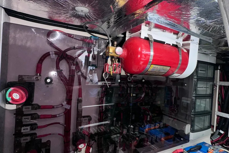 Slide: The Image of Engine room of 2020 Fjord 44 Open with fire suppression system and wiring. - 73