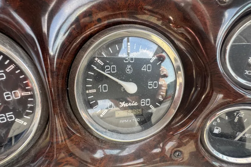 Slide: The Image of Close-up of 2002 Crownline 239 DB boat dashboard with speedometer and gauges. - 19