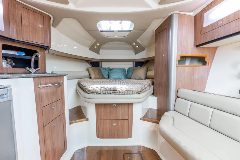 Slide: The Image of Luxurious interior of 2012 Boston Whaler 345 Conquest with cozy bed and modern amenities. - 47