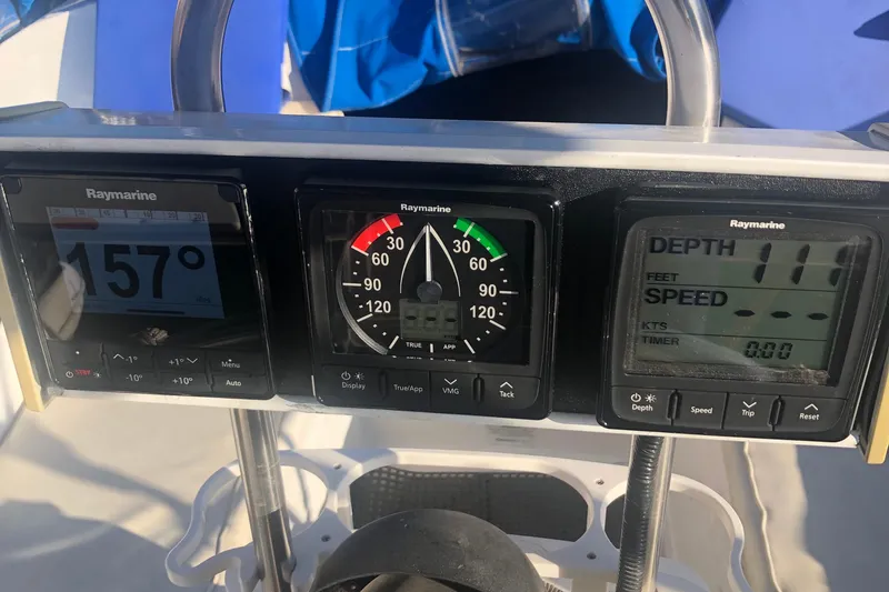 Slide: The Image of Raymarine navigation instruments on a 1996 Catalina 30 MkIII sailboat dashboard. - 19