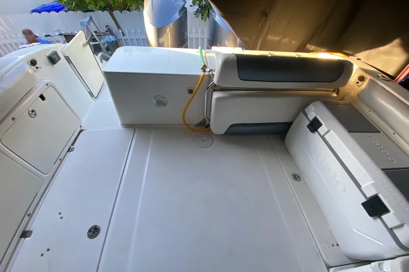 Slide: The Image of 2009 Century 3200 Offshore boat interior with seating and storage compartments. - 18