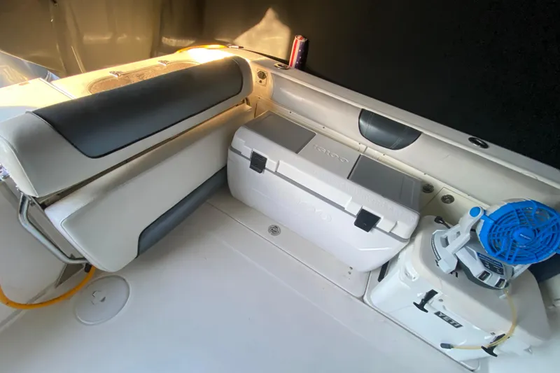 Slide: The Image of Interior of a 2009 Century 3200 Offshore boat with seating and coolers. - 20