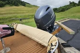 Slide: The Image of 2019 Edge Duck Boats 863 CC with Yamaha outboard motor on wooden deck. - 11