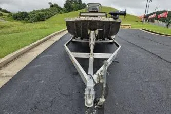 Slide: The Image of 2019 Edge Duck Boats 863 CC on trailer, parked on asphalt near grassy hill. - 8