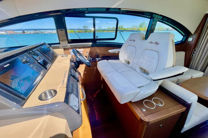Slide: The Image of Interior of 2017 Sea Ray Sundancer 400 yacht with modern helm and seating. - 16