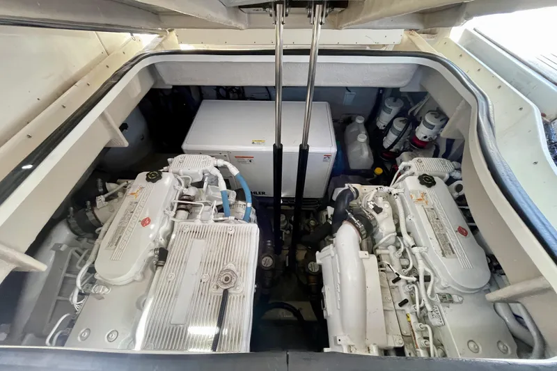 Slide: The Image of Engine room of 2017 Sea Ray Sundancer 400 with dual engines and equipment. - 29