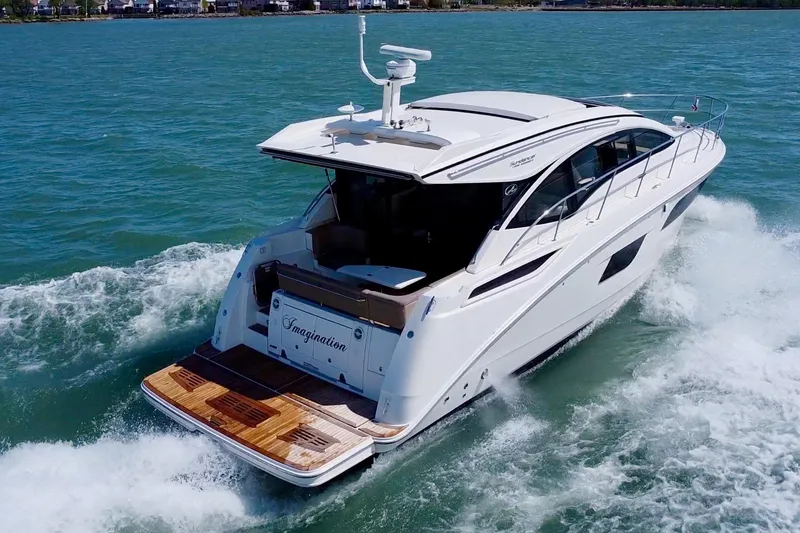 Slide: The Image of 2017 Sea Ray Sundancer 400 yacht cruising on open water. - 3