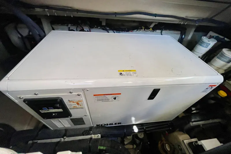 Slide: The Image of Engine room of 2017 Sea Ray Sundancer 400 with Kohler generator. - 32