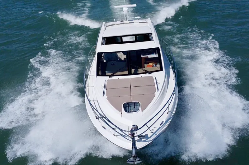 Slide: The Image of 2017 Sea Ray Sundancer 400 cruising on open water, aerial view. - 5