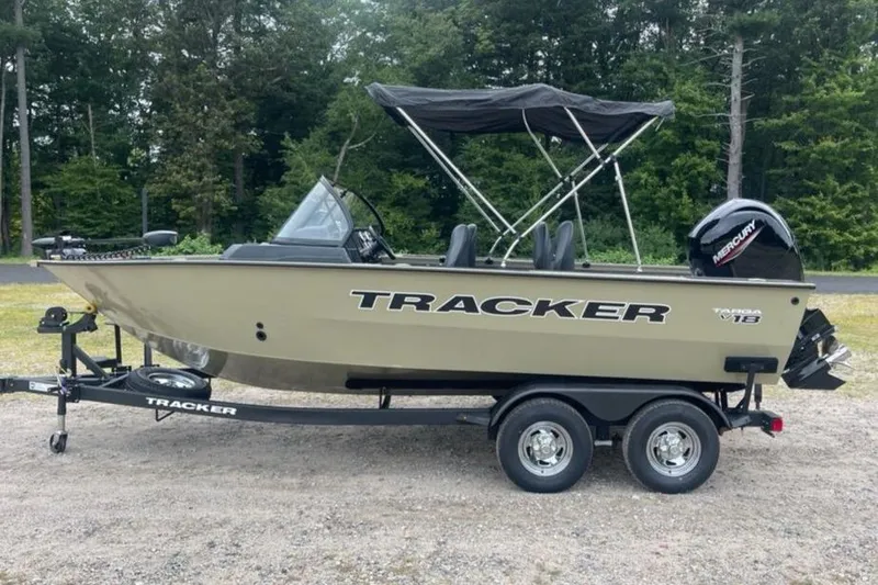 The Image of 2026 Tracker Targa V-18 Combo boat on trailer, parked outdoors. - 0