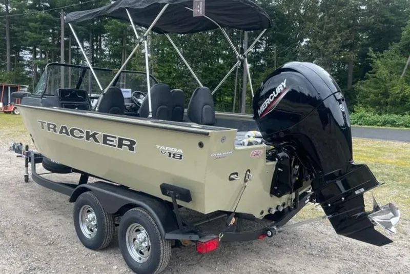 Slide: The Image of 2026 Tracker Targa V-18 Combo boat with Mercury outboard engine on trailer. - 4