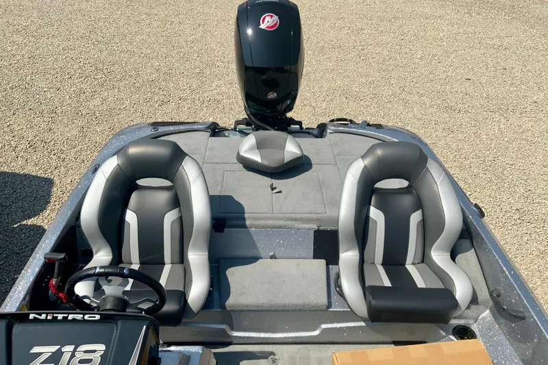Slide: The Image of 2026 Nitro Z18 Pro boat interior with dual seats and steering wheel. - 4