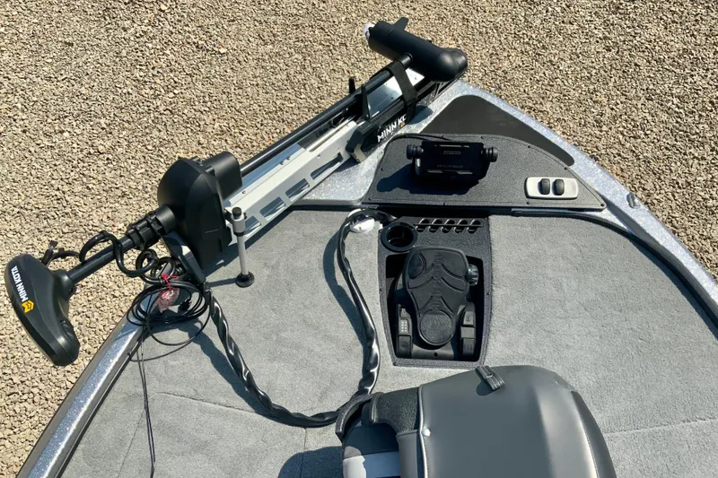 Slide: The Image of 2026 Nitro Z18 Pro boat deck with Minn Kota trolling motor and foot pedal controls. - 8