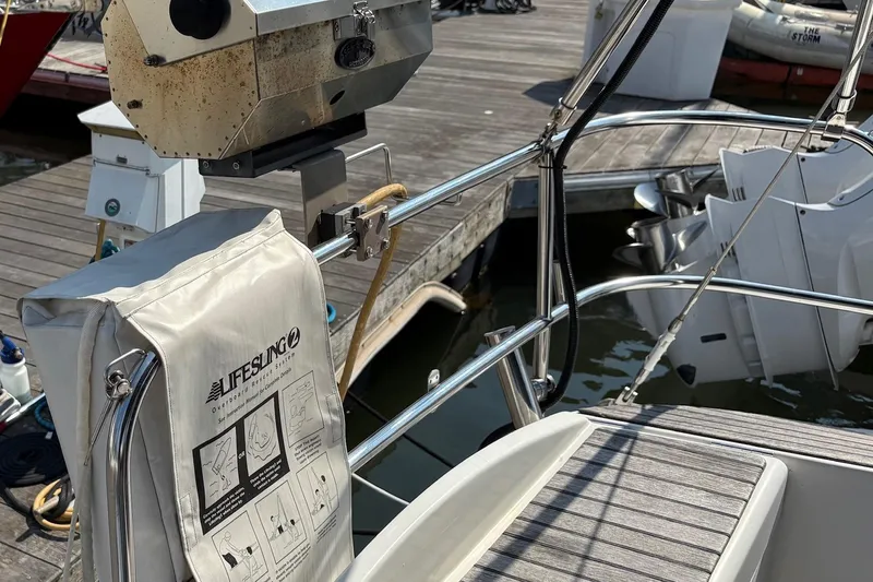 Slide: The Image of 2007 Jeanneau Sun Odyssey 42 DS yacht with Lifesling safety equipment on deck. - 13