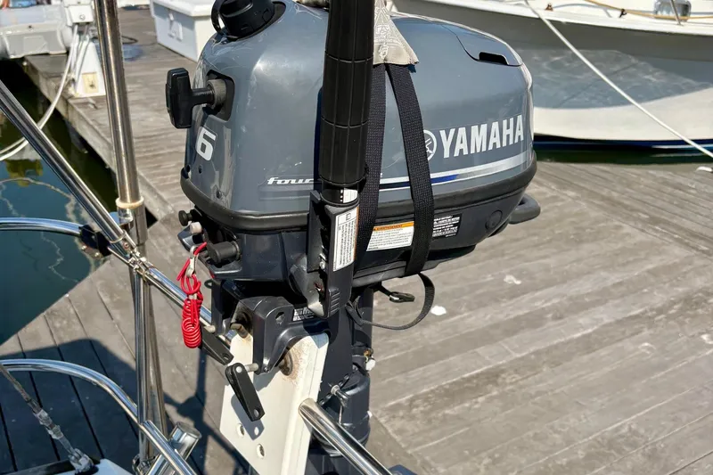Slide: The Image of Yamaha outboard motor on Jeanneau Sun Odyssey 42 DS, 2007 model, docked at marina. - 16