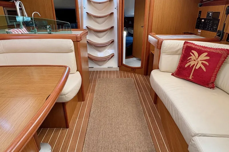 Slide: The Image of Luxurious interior of 2007 Jeanneau Sun Odyssey 42 DS sailboat with elegant wood finish. - 20