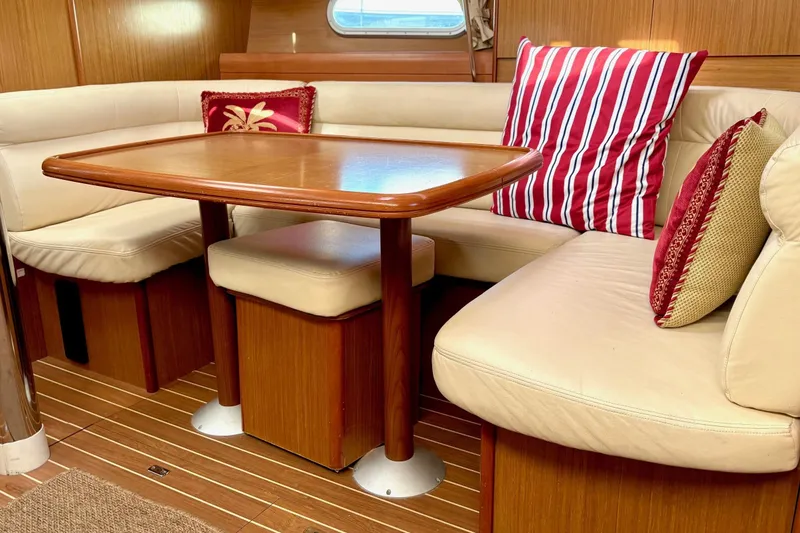 Slide: The Image of Interior of 2007 Jeanneau Sun Odyssey 42 DS with cozy seating and decorative pillows. - 21