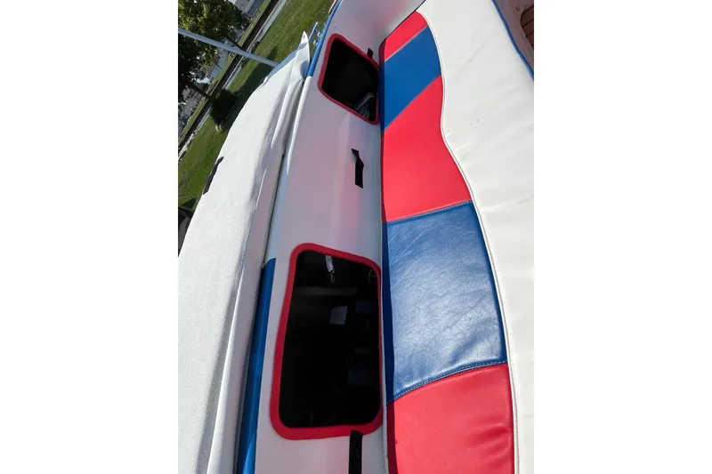 Slide: The Image of Custom boat interior with red, blue, and white upholstery, 2021 model. - 12