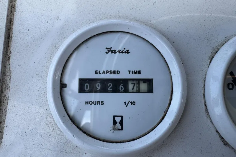 Slide: The Image of Hour meter reading 9267.1 hours on 1998 Mainship 31 Sedan Bridge. - 8