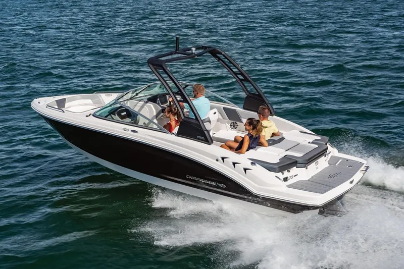 Slide: The Image of Manufacturer Provided Image: 2023 Chaparral 23 SSi boat cruising on open water with passengers. - 27