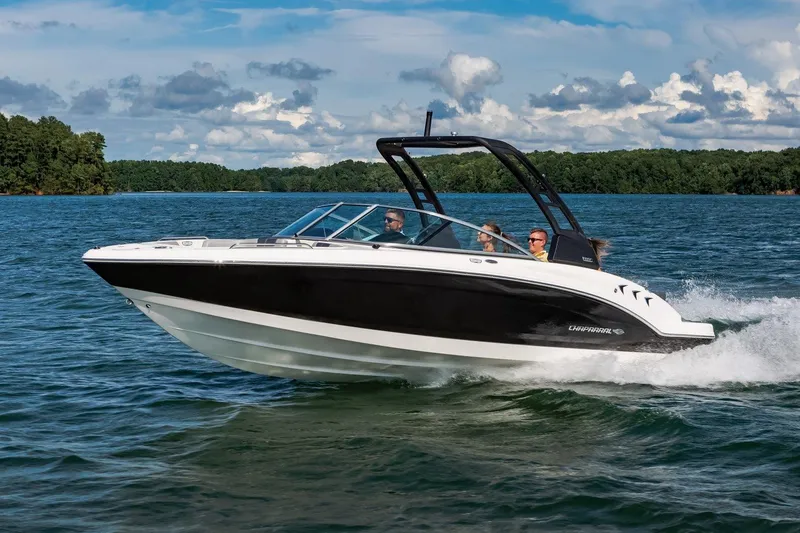 Slide: The Image of Manufacturer Provided Image: 2023 Chaparral 23 SSi boat cruising on a lake with passengers. - 28