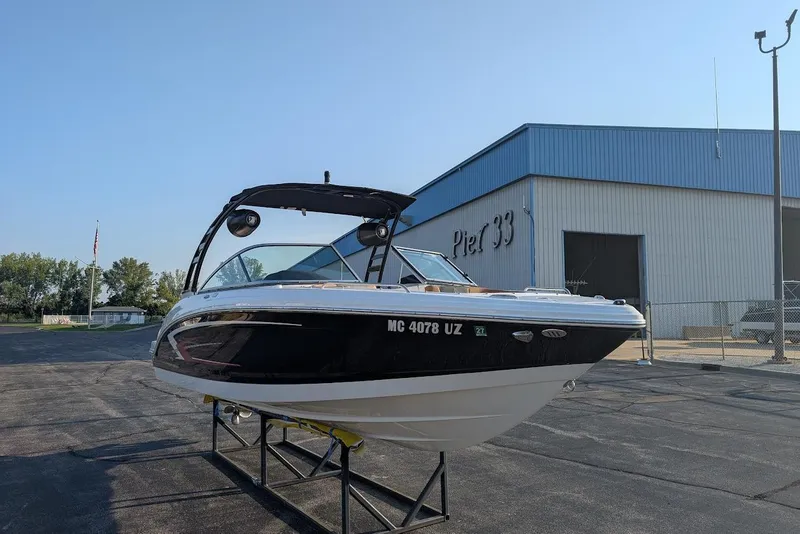 Slide: The Image of 2023 Chaparral 23 SSi boat displayed at Pier 33 marina. - 3