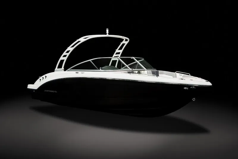 Slide: The Image of Manufacturer Provided Image: 2023 Chaparral 23 SSi boat with sleek black and white design. - 37