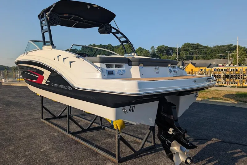 Slide: The Image of 2023 Chaparral 23 SSi boat on display, featuring sleek design and modern features. - 7