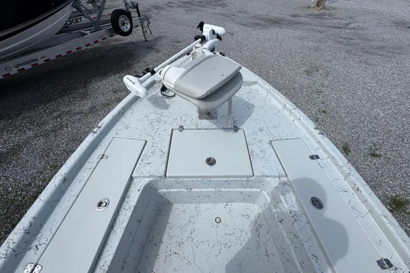 Slide: The Image of 2018 Blazer Bay 2170 boat deck with seating and storage compartments. - 15