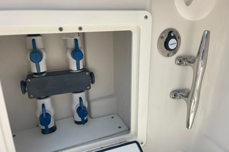 Slide: The Image of Boat plumbing system on a 2020 Jupiter 38, featuring valves and controls. - 22