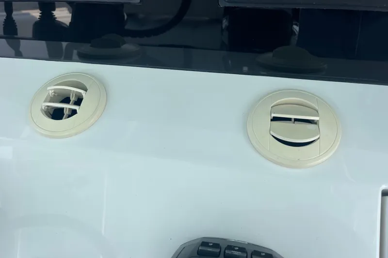 Slide: The Image of Air vents on a 2020 Jupiter 38 boat dashboard. - 30