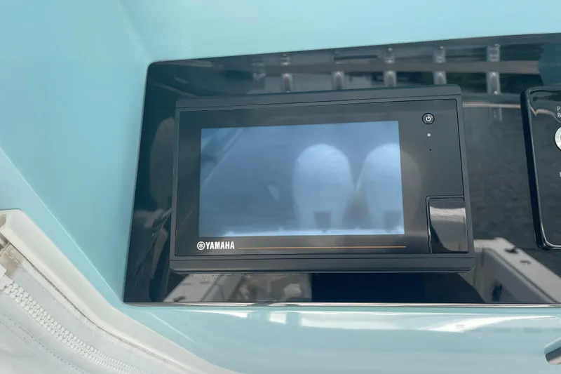 Slide: The Image of Yamaha display screen on 2020 Jupiter 38 boat dashboard. - 37