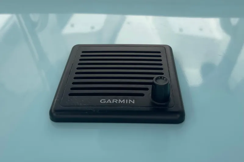 Slide: The Image of Garmin speaker on a 2020 Jupiter 38 boat dashboard. - 40