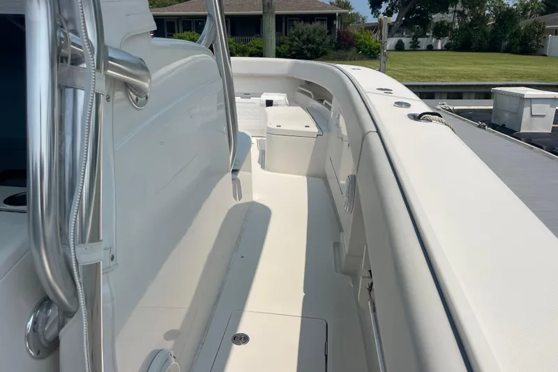 Slide: The Image of 2020 Jupiter 38 boat deck with sleek white design and stainless steel railings. - 50