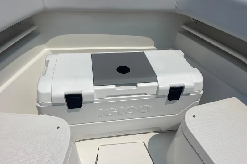 Slide: The Image of White Igloo cooler on a 2020 Jupiter 38 boat deck. - 71