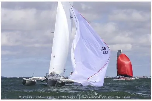 Slide: The Image of Sailboats racing in Buzzelli Multihull Regatta, featuring 2006 Corsair Sprint 750. - 19