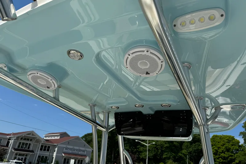 Slide: The Image of 2024 Bulls Bay 255 boat T-top with speakers and LED lights. - 12
