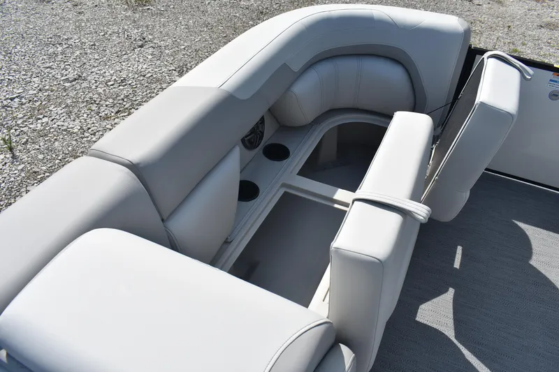 Slide: The Image of 2026 Godfrey SWEETWATER SW 2086 C boat interior with white cushioned seating and storage. - 10