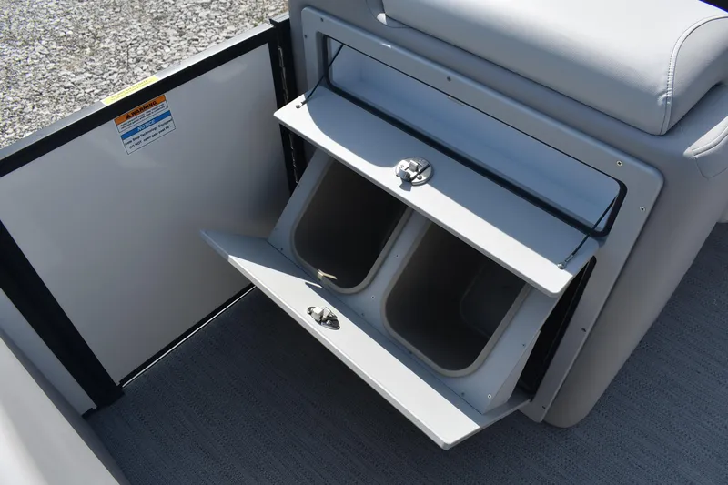 Slide: The Image of Storage compartment on 2026 Godfrey SWEETWATER SW 2086 C boat, featuring dual bins. - 11