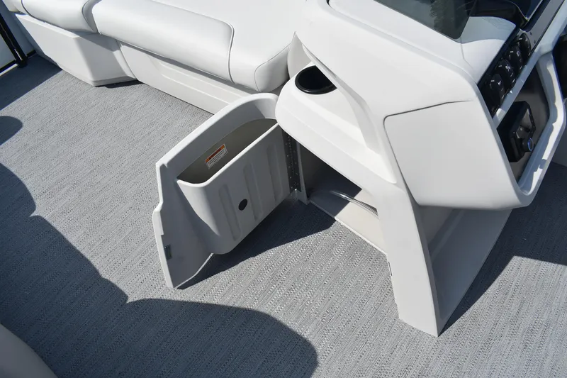 Slide: The Image of 2026 Godfrey SWEETWATER SW 2086 C boat interior with open storage compartment. - 12