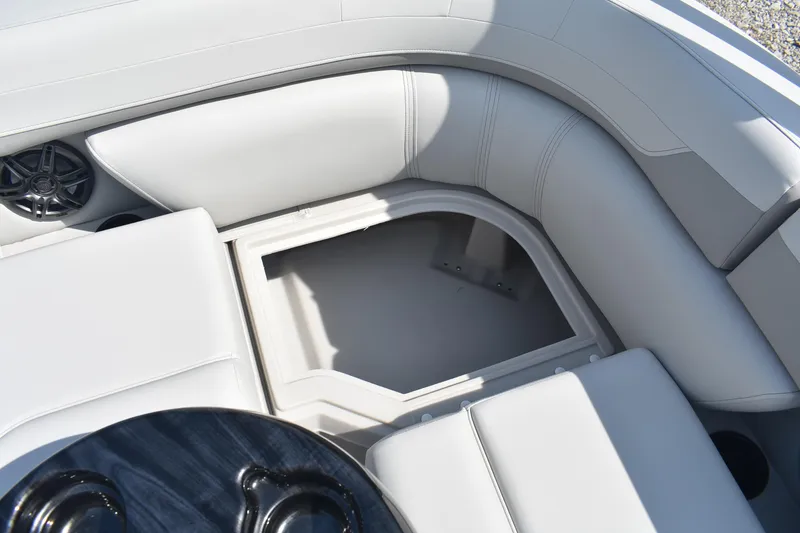 Slide: The Image of 2026 Godfrey SWEETWATER SW 2086 C boat interior with open storage compartment. - 15